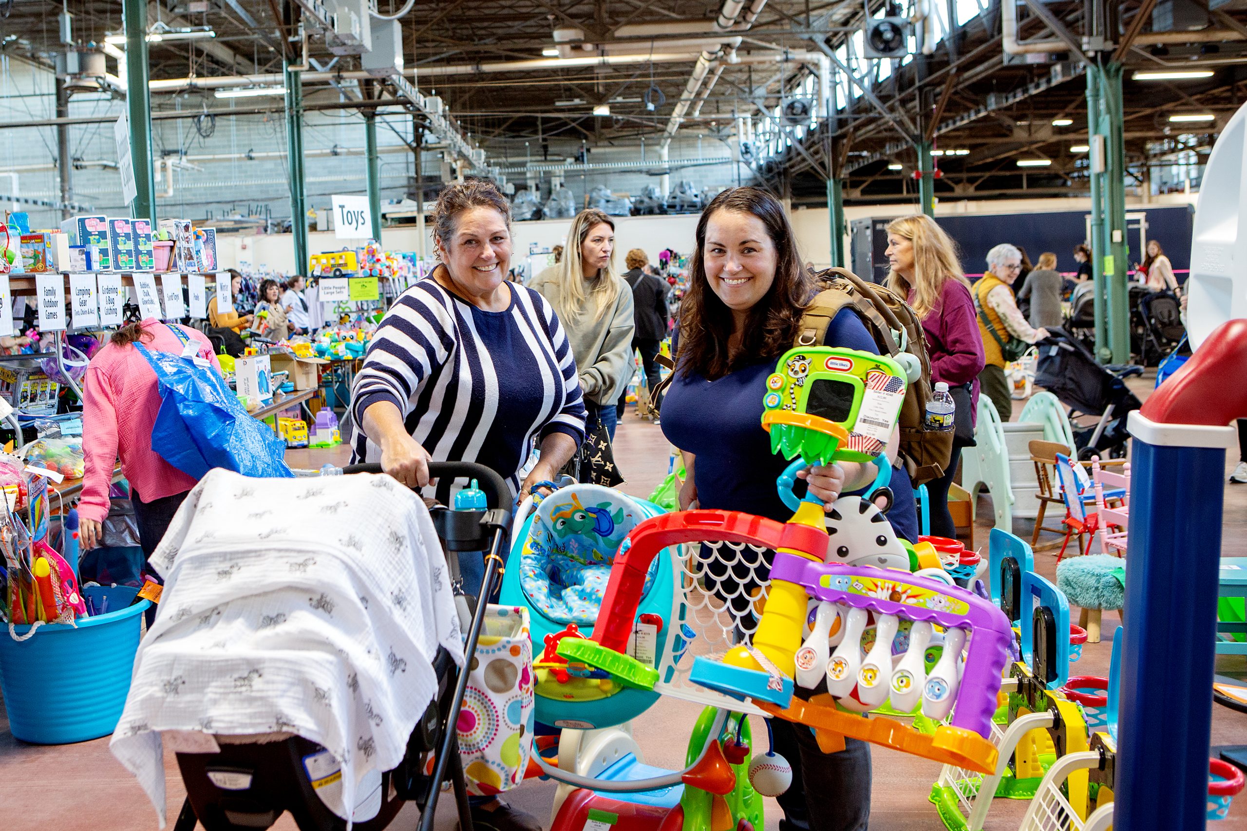 Shoppers browsing the WeeUsables Harrisburg sale floor